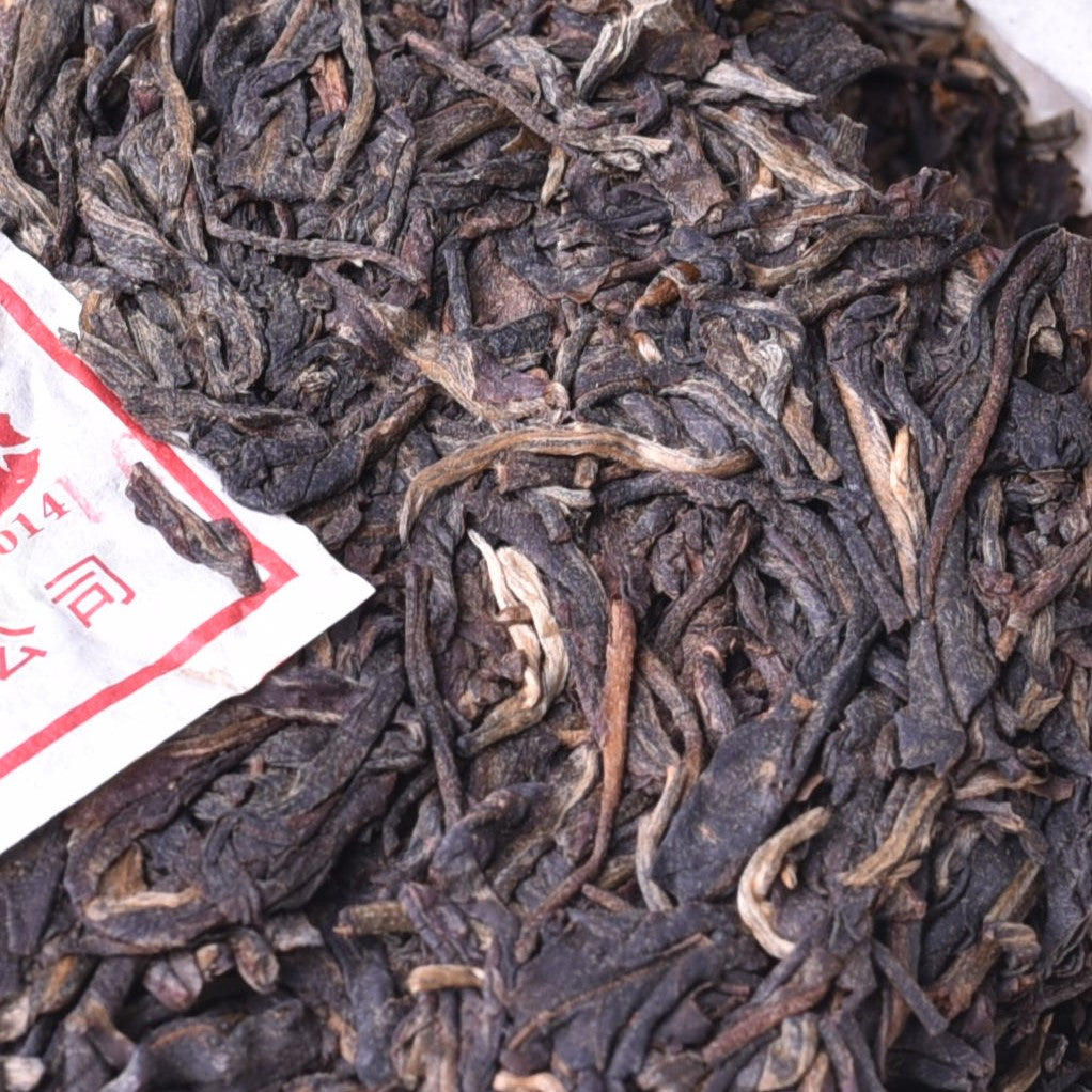 Lancang Ancient Tea Company 2014 "Man Nong Old Arbor (曼弄古树)" Raw Puerh