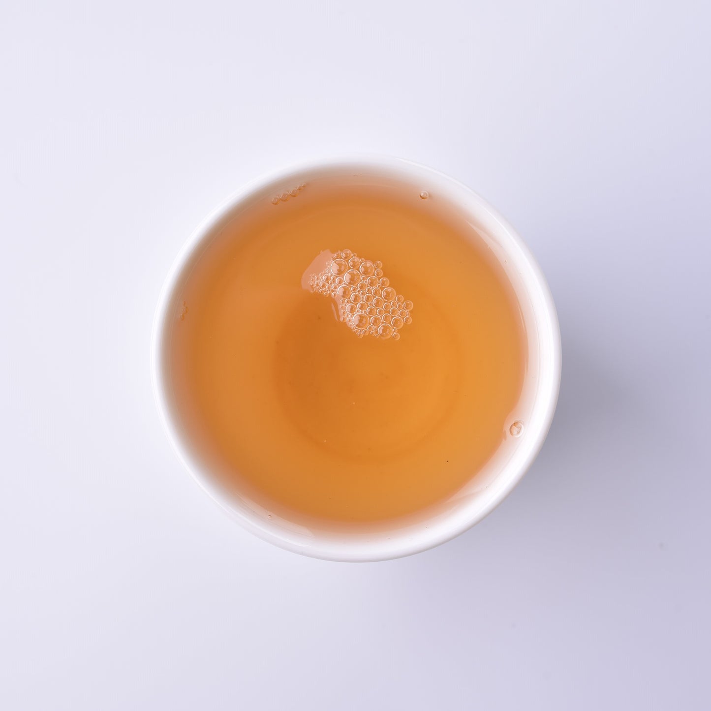 Ma Li Shu Sheng / raw Puerh tea soup in a cup