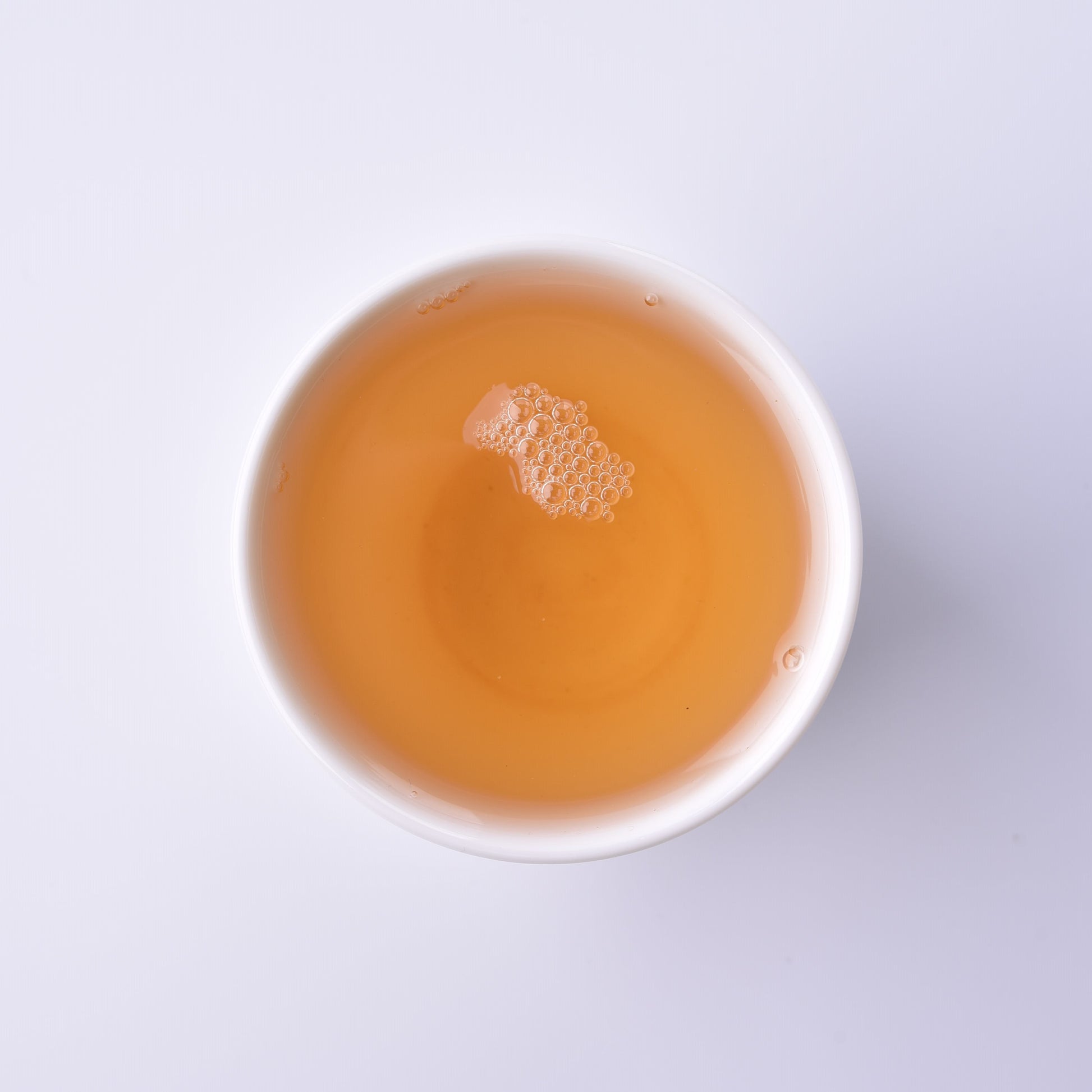 Ma Li Shu Sheng / raw Puerh tea soup in a cup